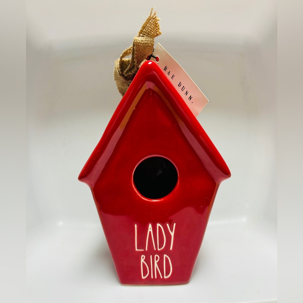 Rae Dunn “lady bird” bird house, red with white letters & burlap ribbon, NWT.